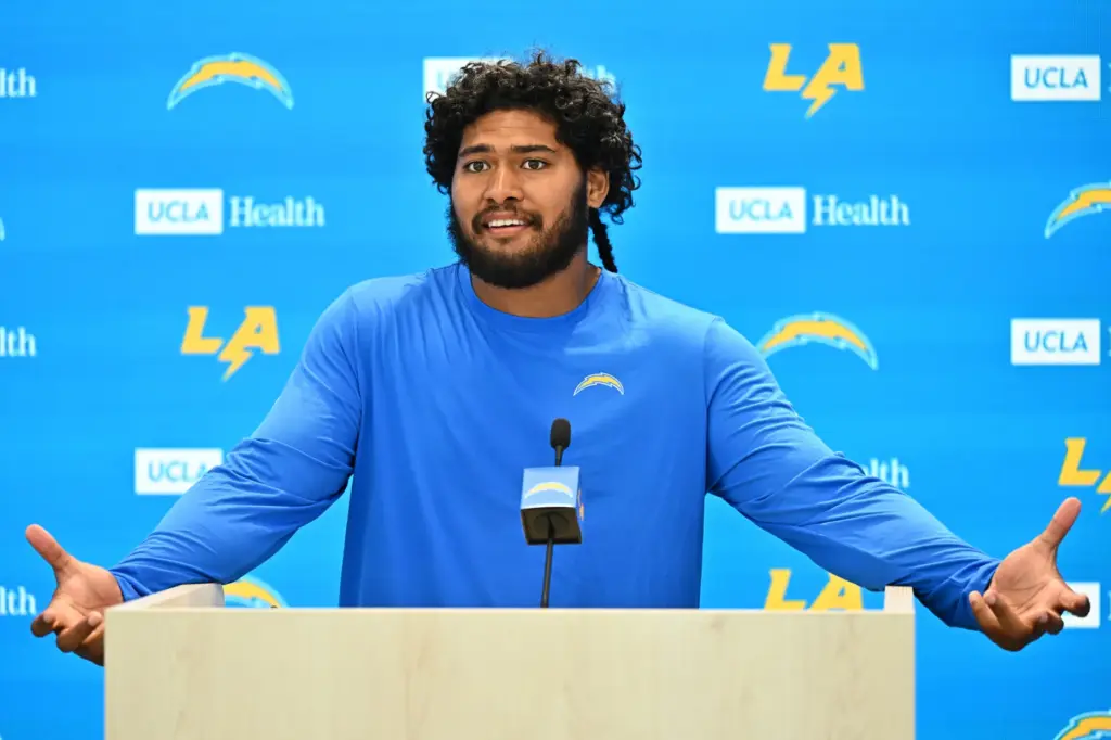 Chargers linebacker Tuli Tuipulotu speaks to the media at the...