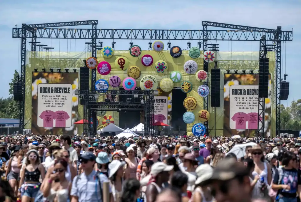 Thousands of festivalgoers flock away from the Marigold Stage following...