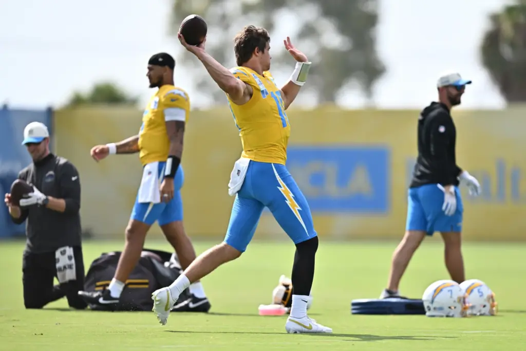 Chargers quarterback Justin Herbert throws a pass during a training...