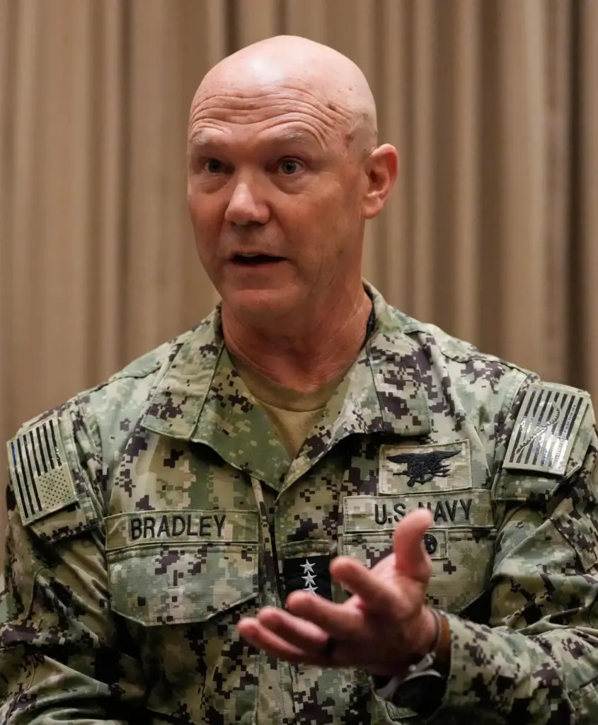 United States Navy Admiral Frank Bradley gestures during an interview.