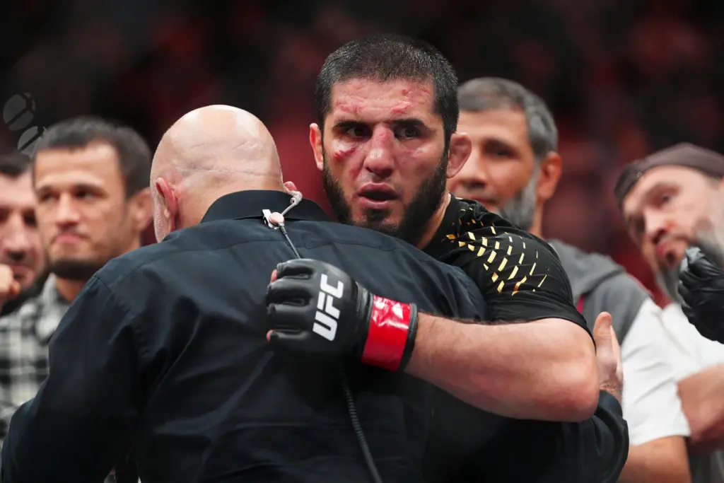 Islam Makhachev, right, reacts following an interview after defeating Ian...