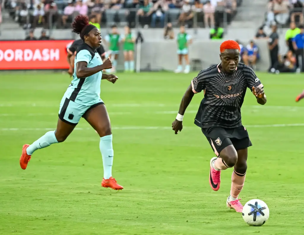 Angel City FC forward Prisca Chilufya (24) dribbles upfield against...