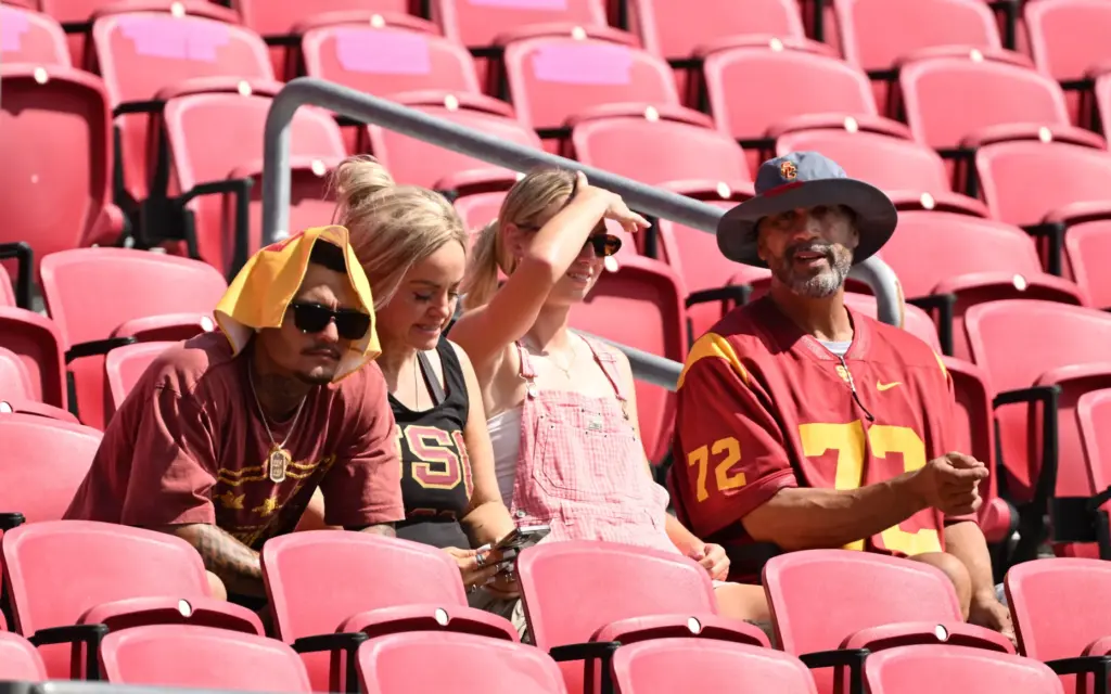 USC Trojans fans try and stay cool prior to a...