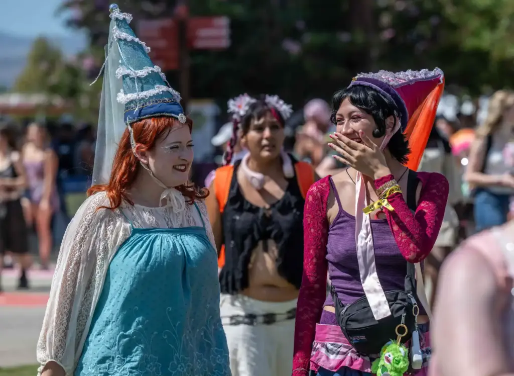 Festivalgoers arrive at the Daisy Chain Fields Festival at the...