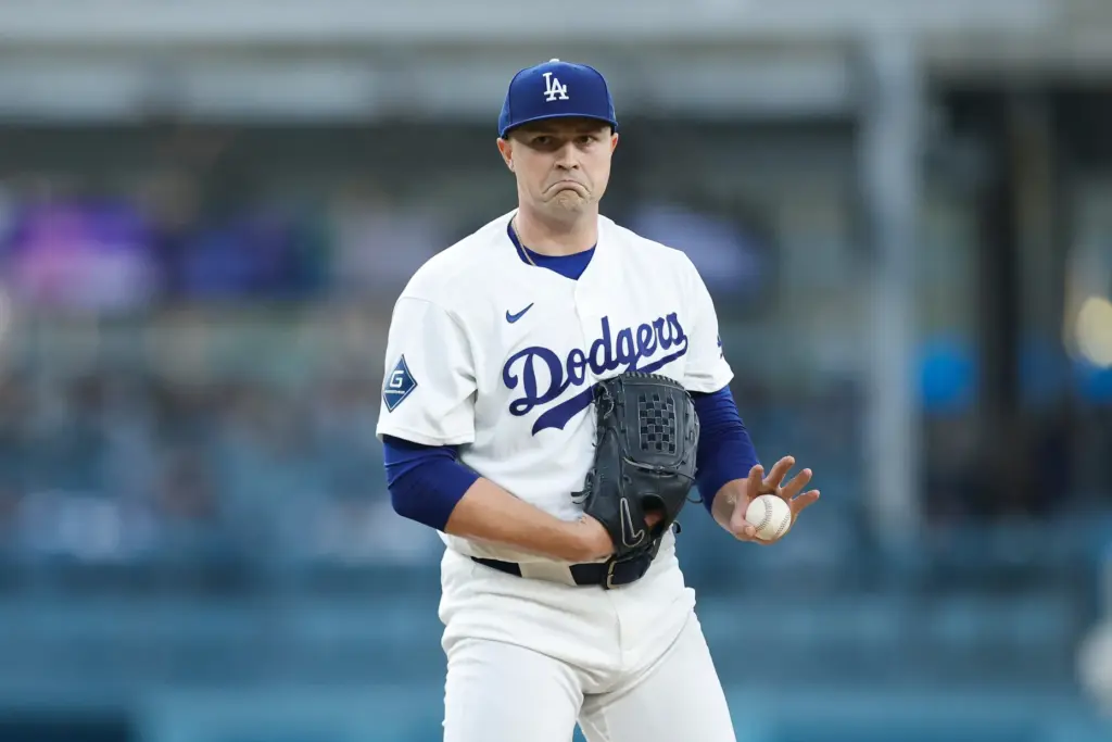 Dodgers starting pitcher Tarik Skubal reacts between batters during the...