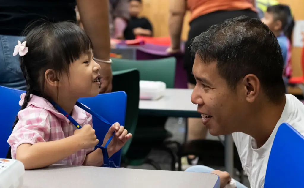 Olivia Nguyen talks with her dad Thai in her transitional...
