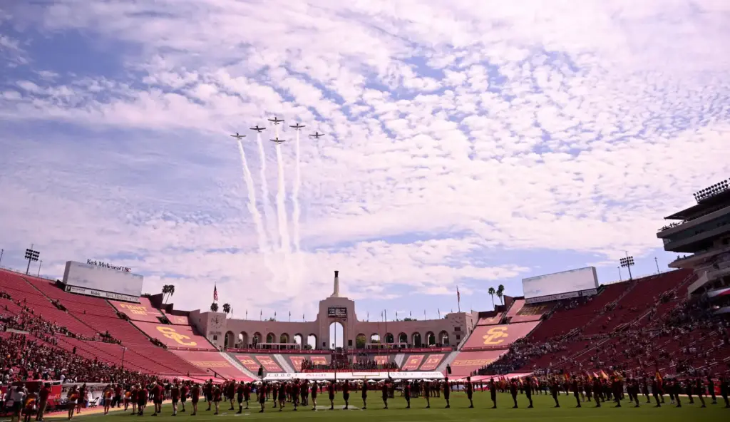 The USC Trojans bands performs the National with a flyover...