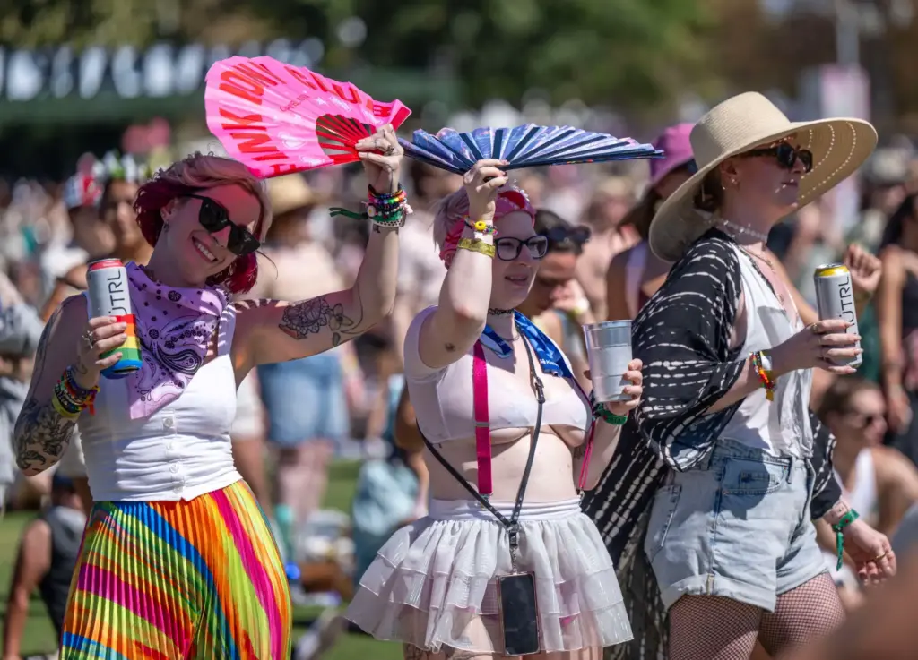 Friends dance together while The Breeders perform on the Marigold...