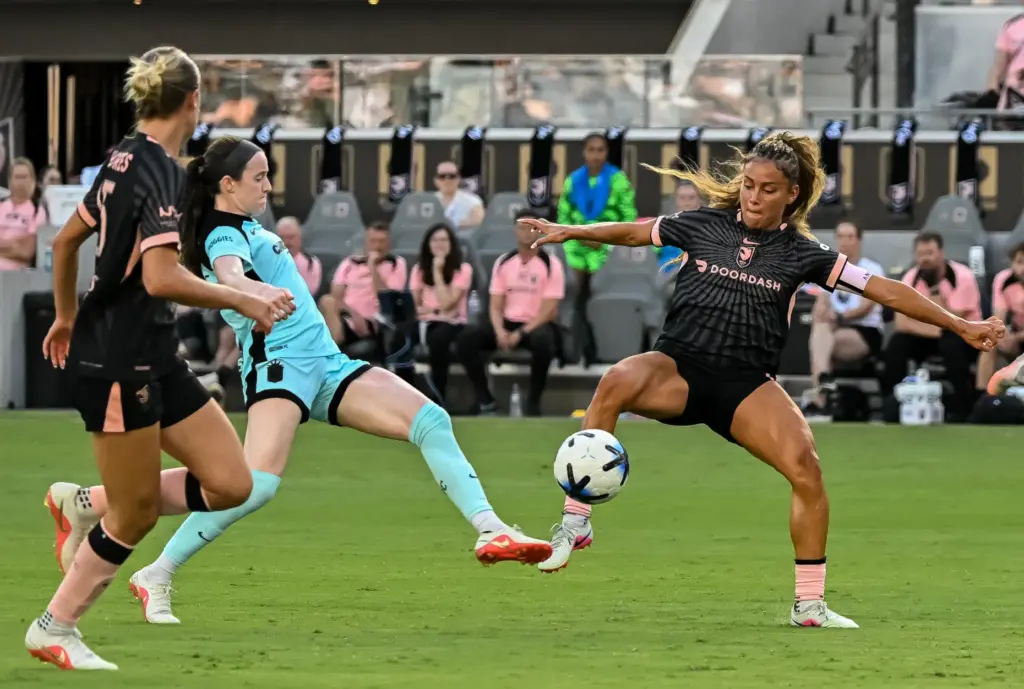 Angel City FC defender Sarah Gorden (11) wins control of...