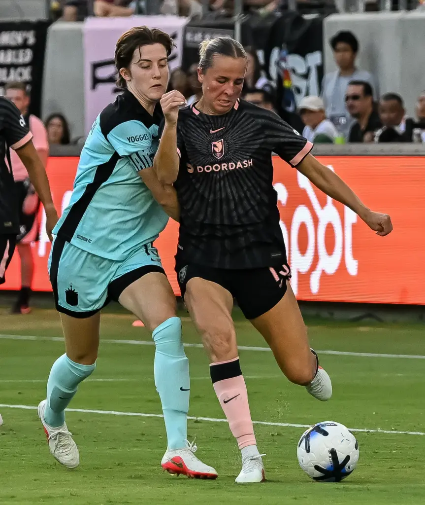 Angel City FC defender Evelyn Shores (15) wins control of...