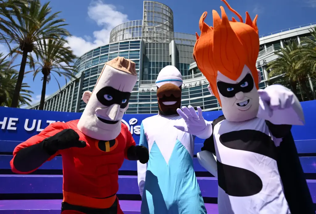 Frank de Jesus, dressed as Mr. Incredible, and his sons,...
