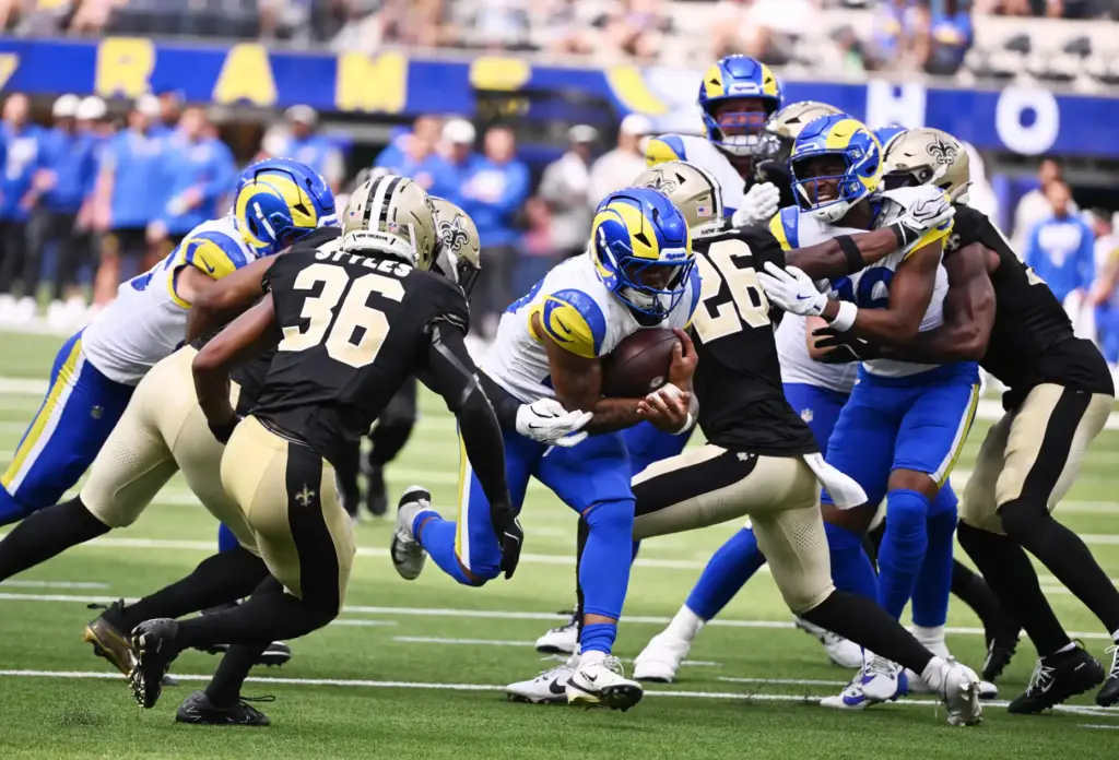 Rams running back Jarquez Hunter (27) runs for a first...