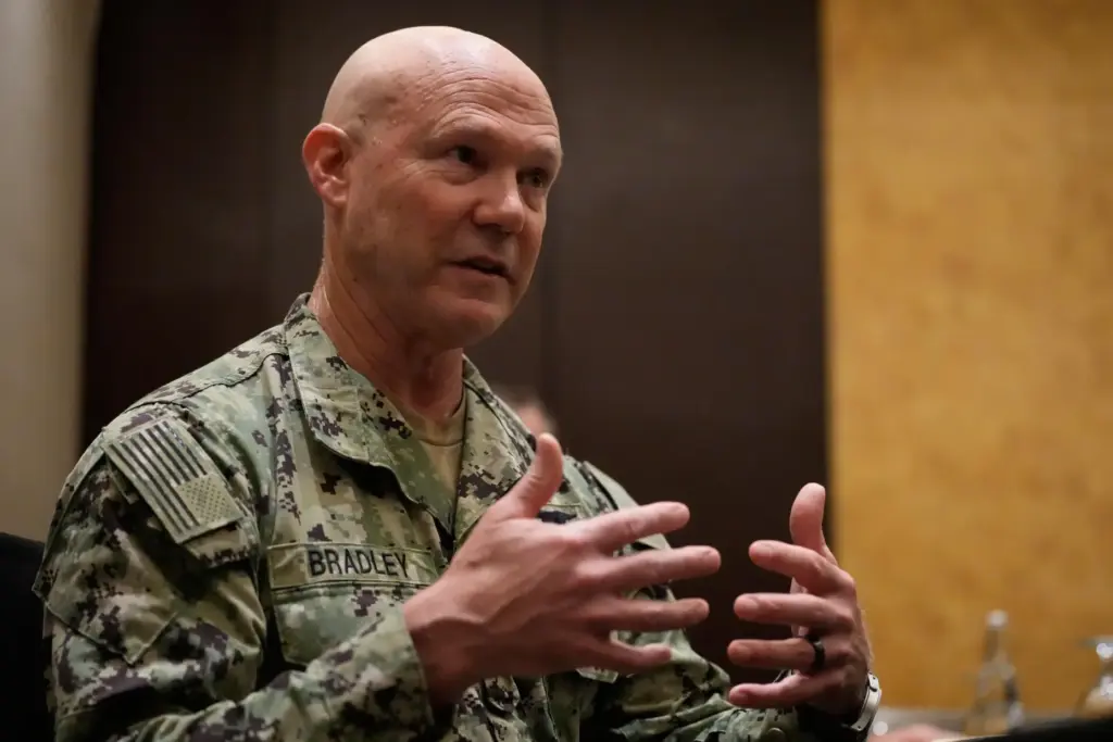 United States Navy Admiral Frank Bradley gestures during an interview.