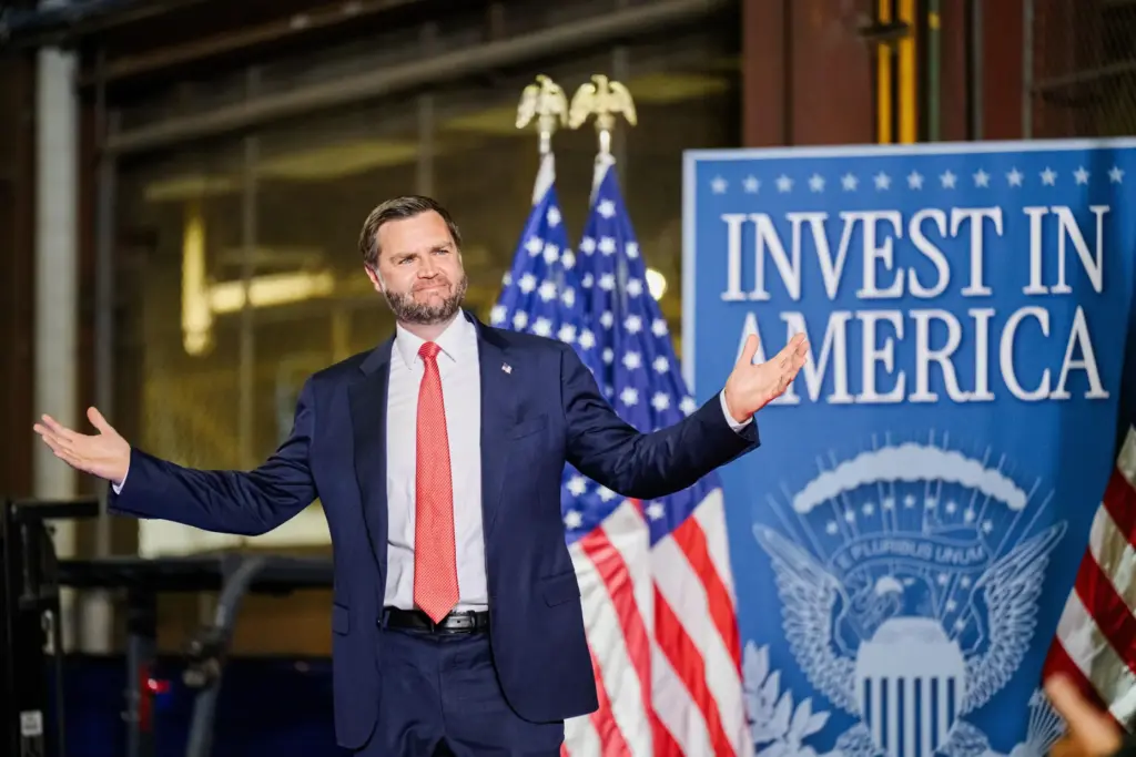 Vice President JD Vance walks on stage at the Cleveland...