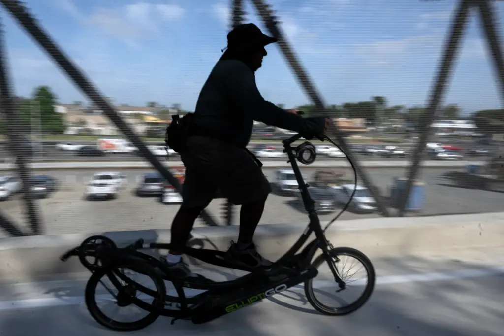 An Elliptigo rider zooms through the newly opened Jeffrey Open...