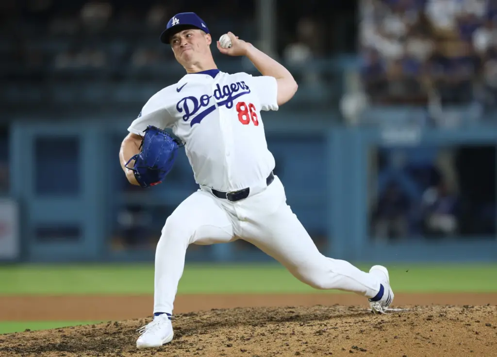 Dodgers relief pitcher Jack Dreyer throws to the plate during...
