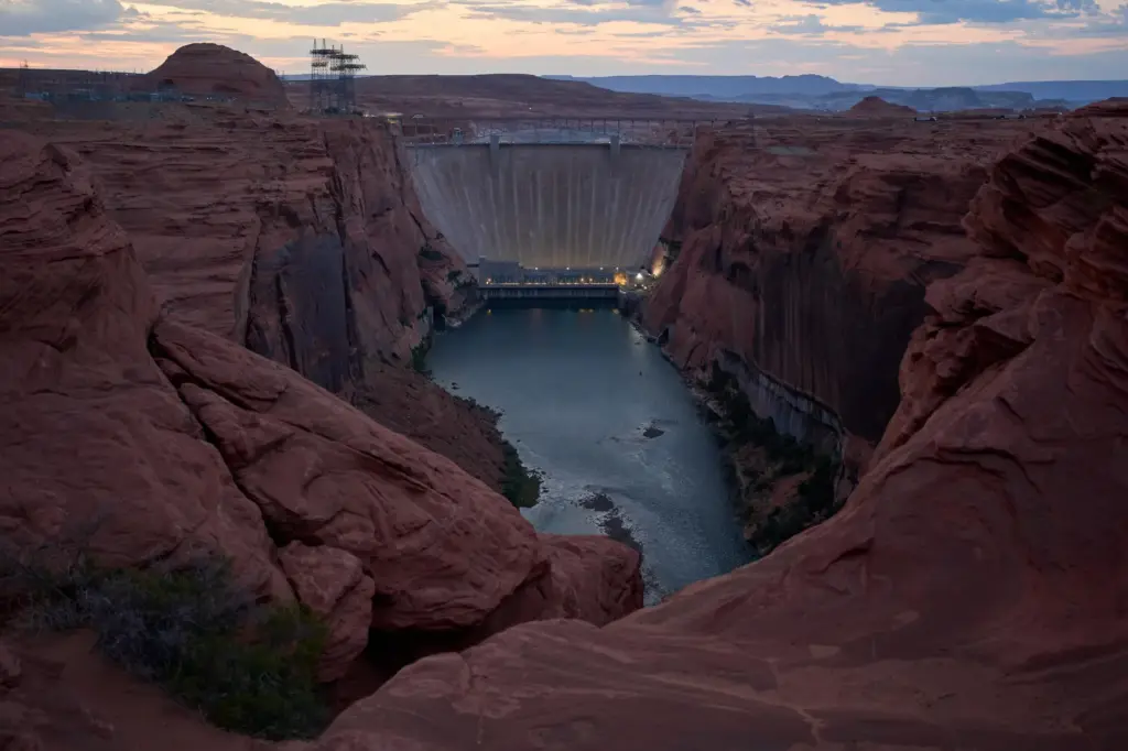 The Colorado River flows beneath the Glen Canyon Dam.