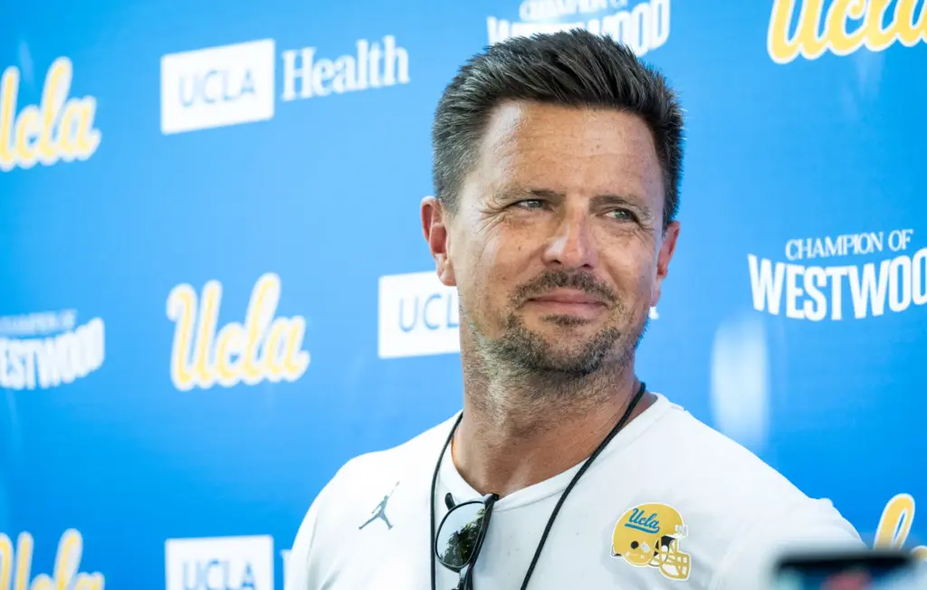 UCLA head coach Bob Chesney talks to the media following...