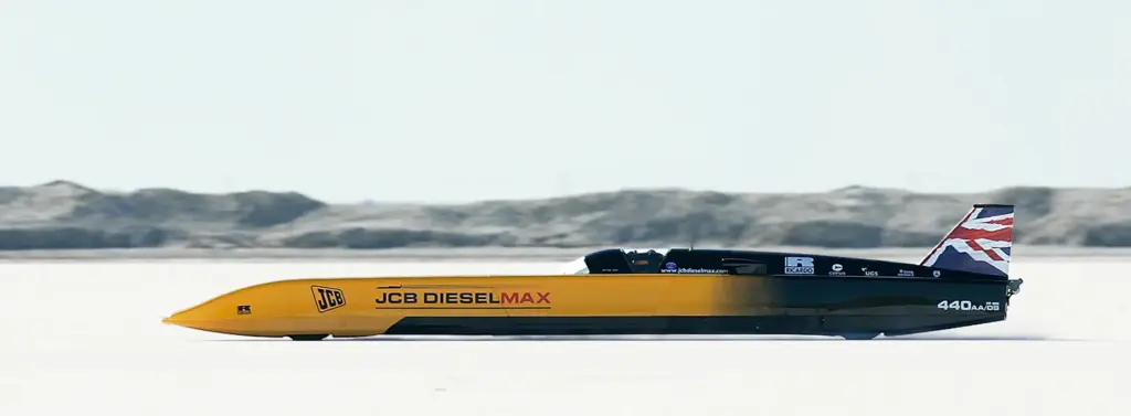 FILE – British driver Andy Green goes for a new...