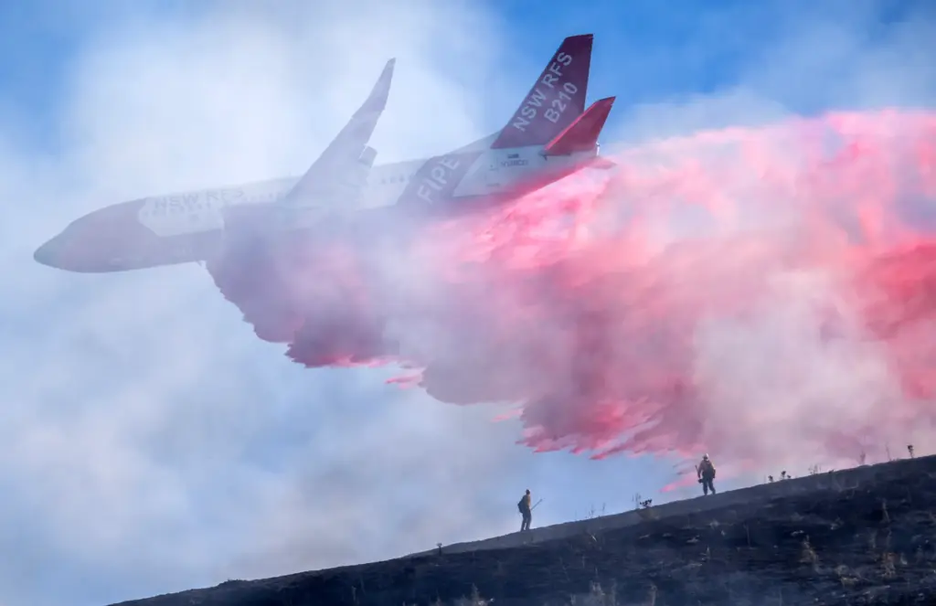 An NSW RFS “Bomber 210” Boeing 737-300 Large Air Tanker...