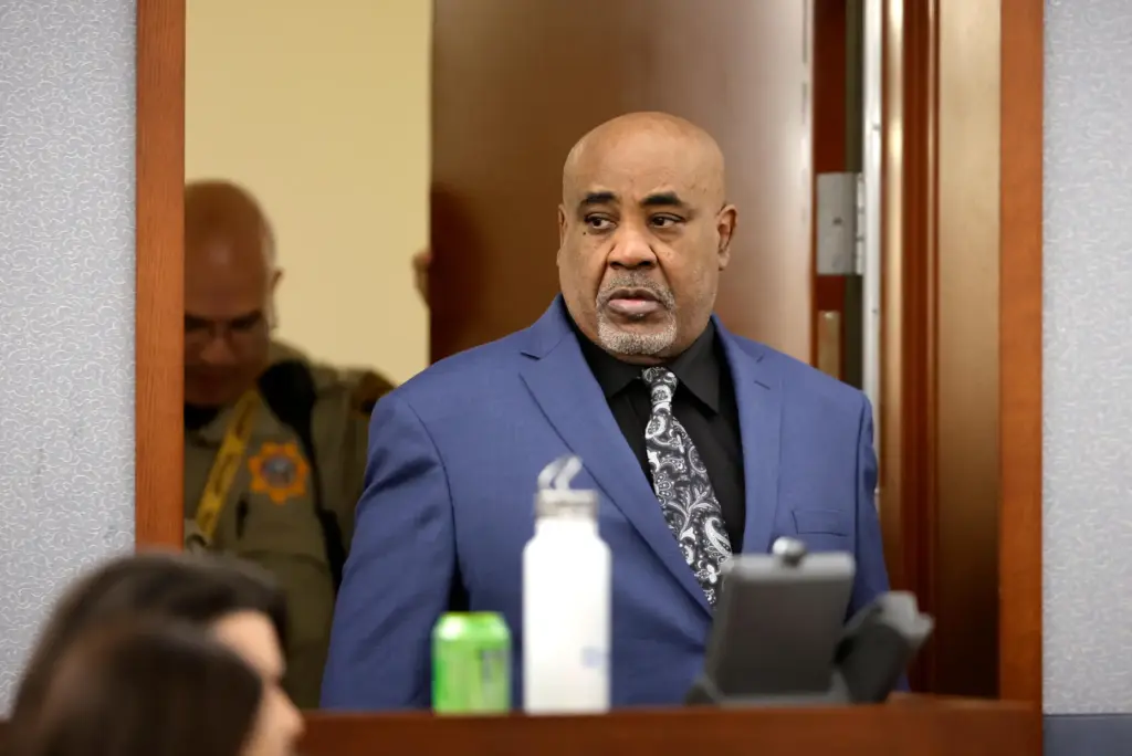 Duane Davis enters the courtroom during his trial.