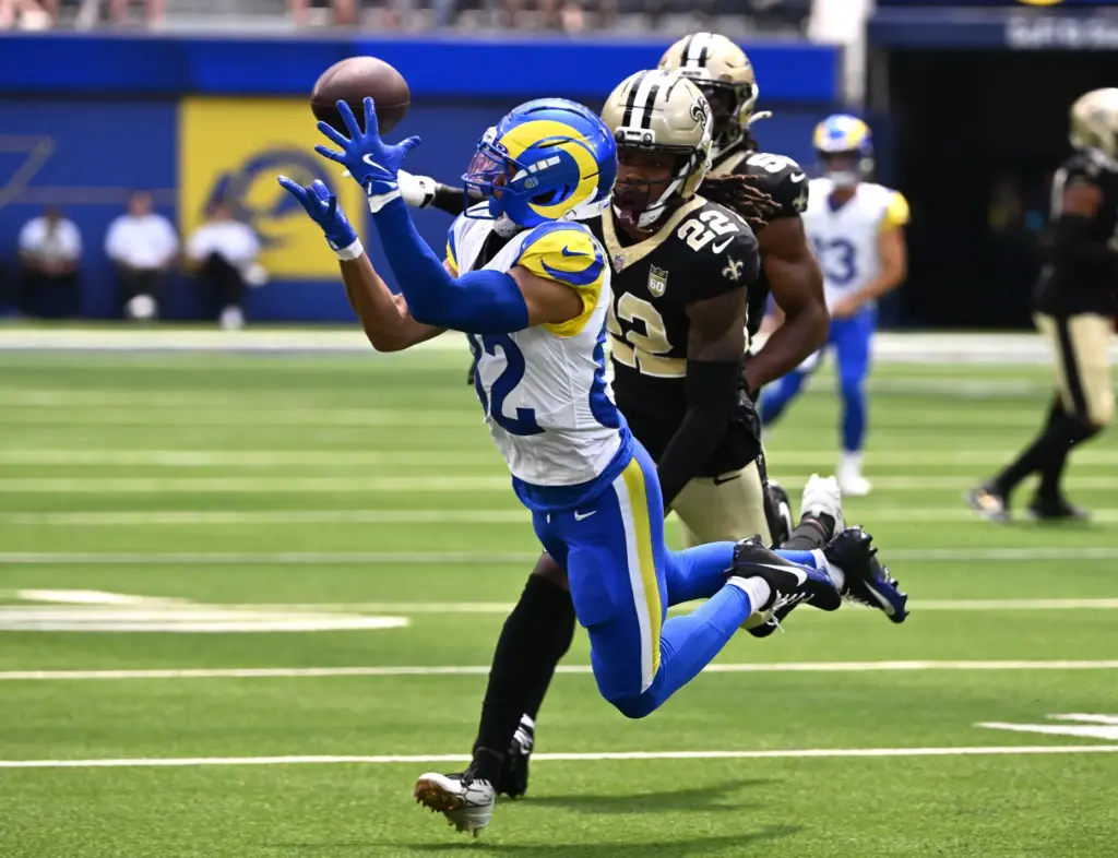 Rams wide receiver Tyler Scott (82) catches a pass for...