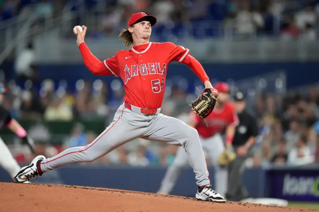 Angels starting pitcher George Klassen throws to the plate during...