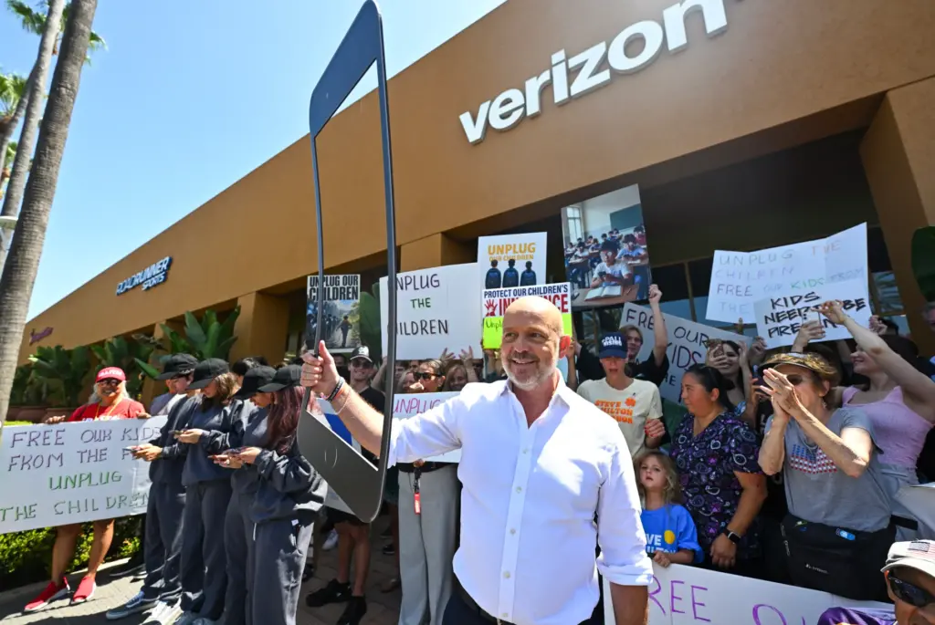 California gubernatorial candidate Steve Hilton holds an outline of a...