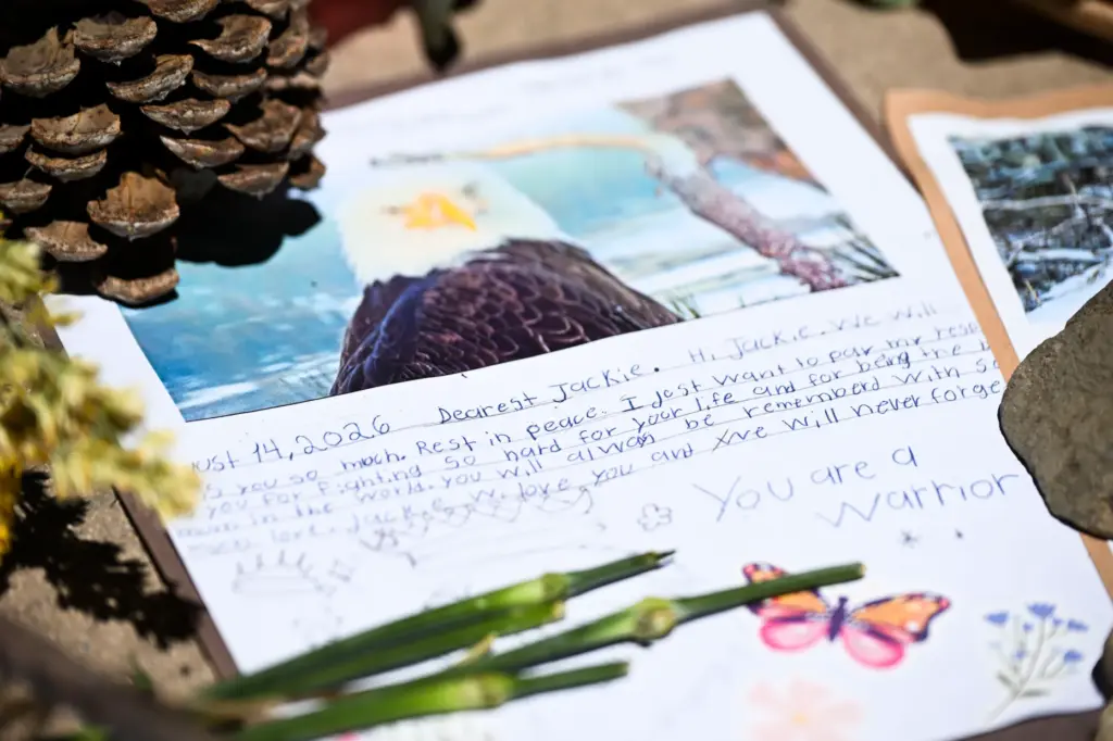 Touching notes are left at the memorial for Jackie, the...