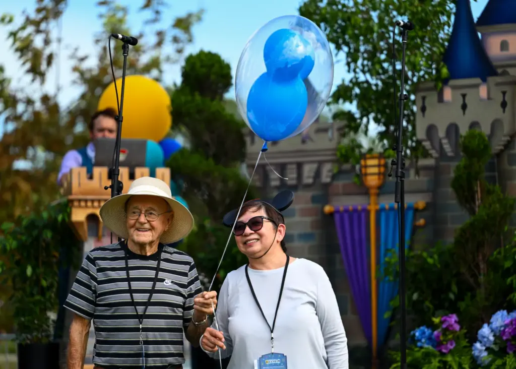 Friends Roy Langenwaler and Tammy Nguyen hang out during Disneyâs...