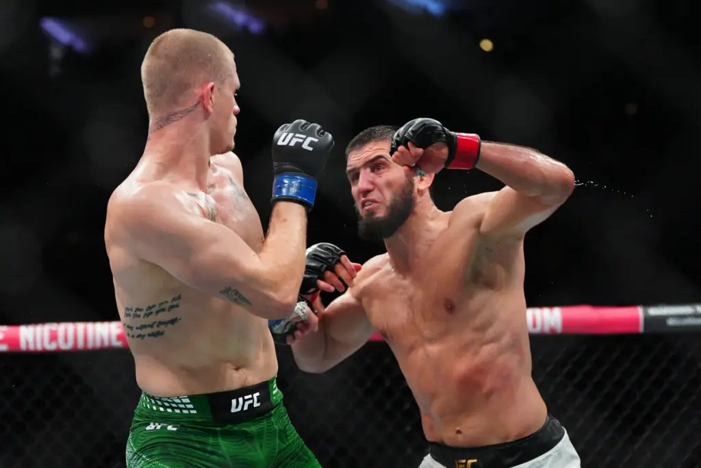 Islam Makhachev, right, punches Ian Machado Garry in a welterweight...