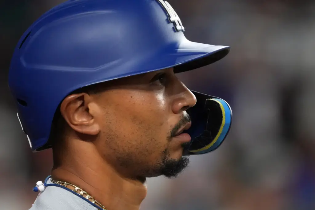 The Dodgers’ Mookie Betts looks on before batting during a...
