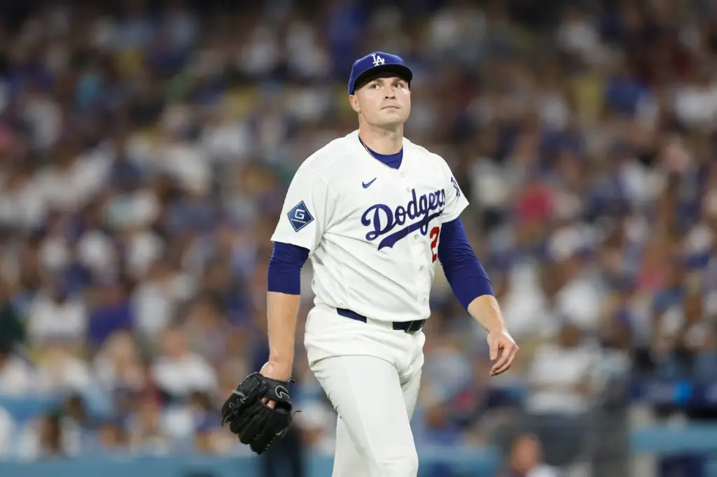 Dodgers starting pitcher Tarik Skubal walks off the field at...