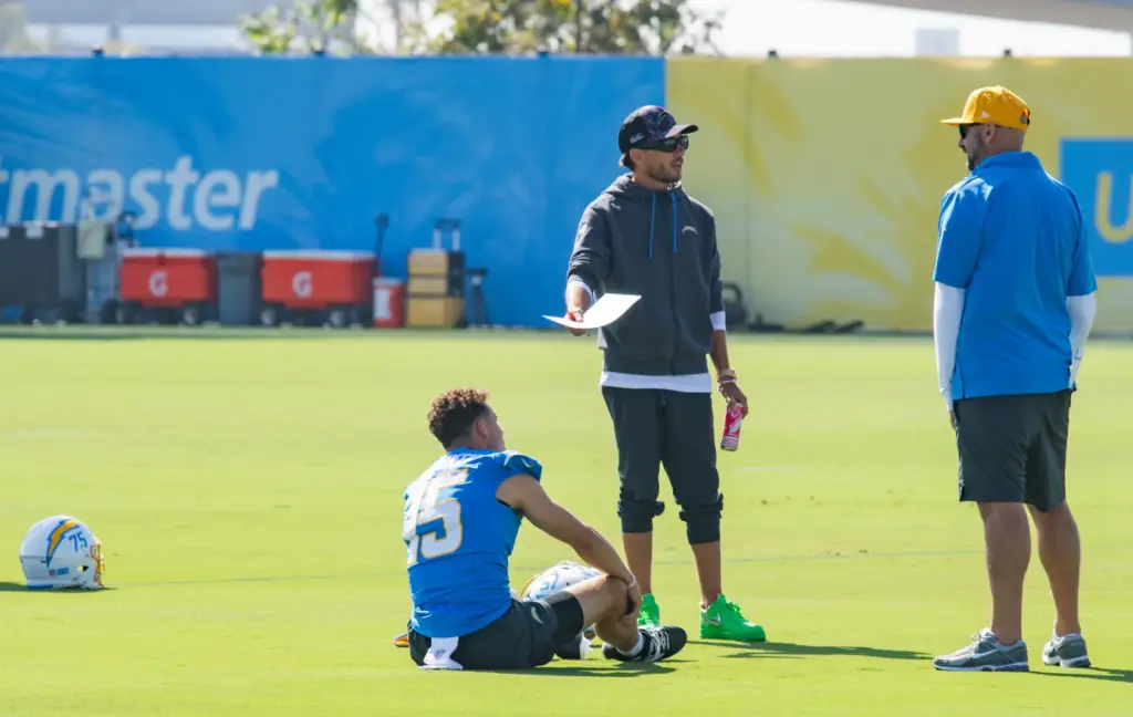 Los Angeles Chargers wide receiver Ladd McConkey stretches on the...