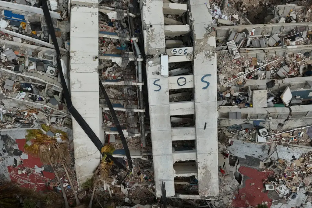 A building damaged during the earthquakes is marked with 