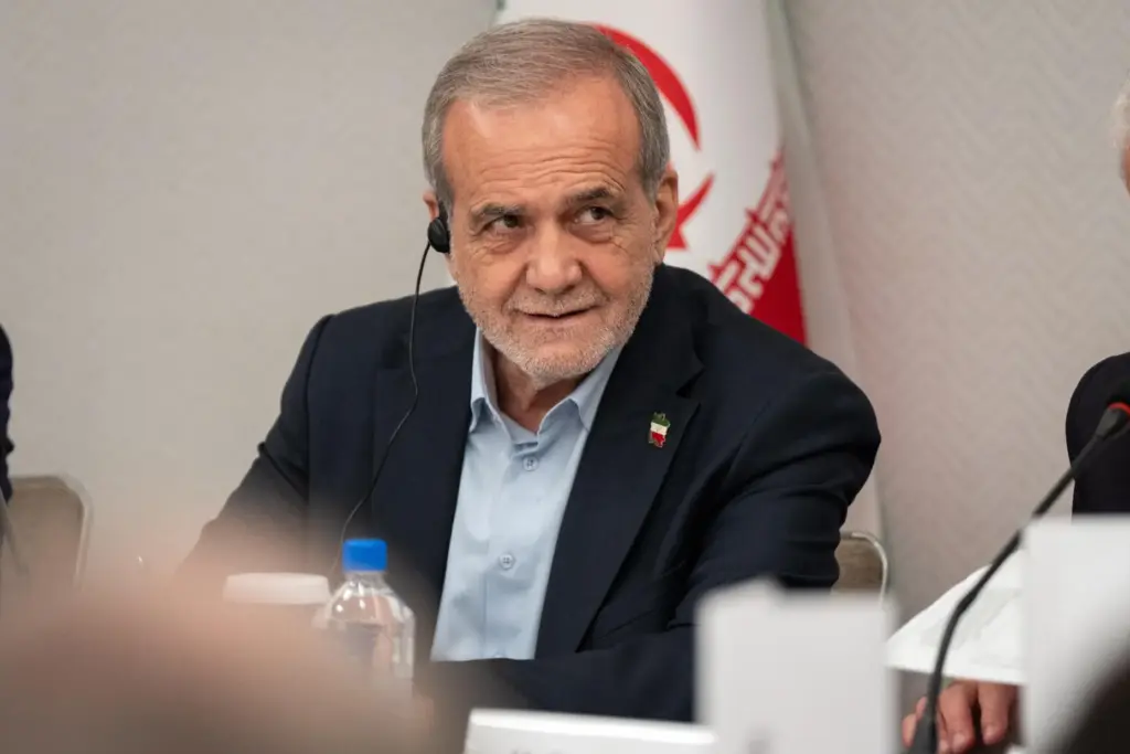 FILE – President of Iran Masoud Pezeshkian takes questions from...