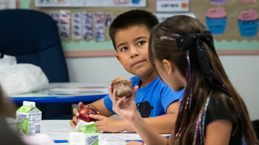 Eli Armenta and Emma King talk during breakfast at Pacific...