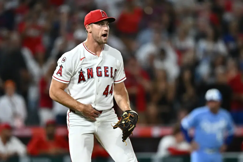 Angels pitcher Ben Joyce reacts after defeating the Kansas City...