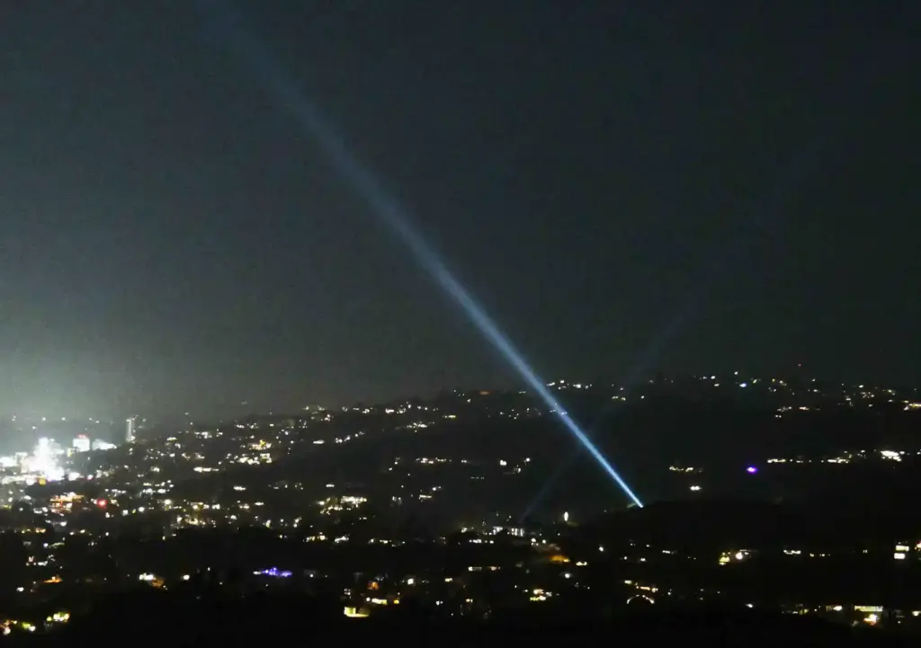 A spotlight in Hollywood is aimed at the moon Thursday,...