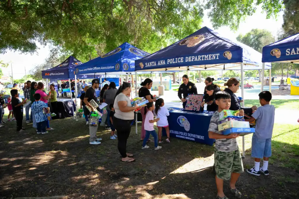 People attend the National Night Out event at Jerome Park...