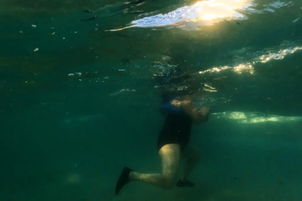 A woman cools off in the Mediterranean Sea during a heat wave.