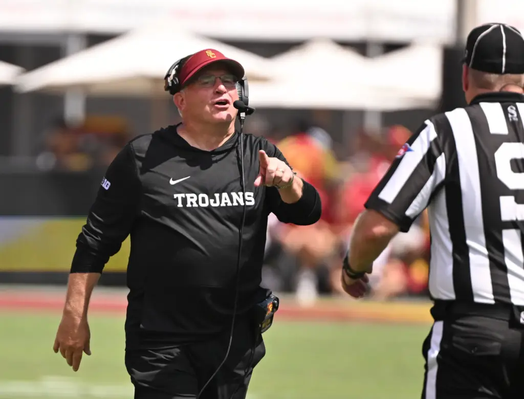 Defensive coordinator, Gary Patterson of the USC Trojans reacts against...