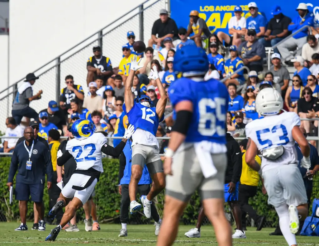 Rams wide receiver Puka Nacua (12) makes a catch while...