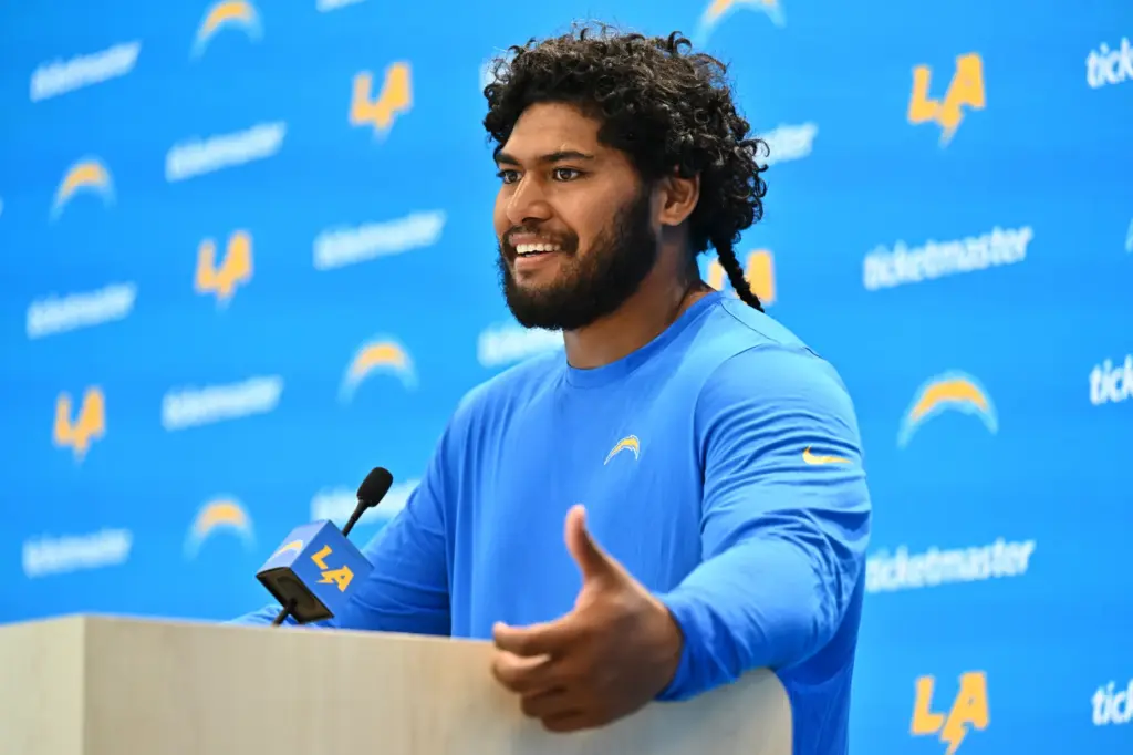 Chargers linebacker Tuli Tuipulotu speaks to the media at the...