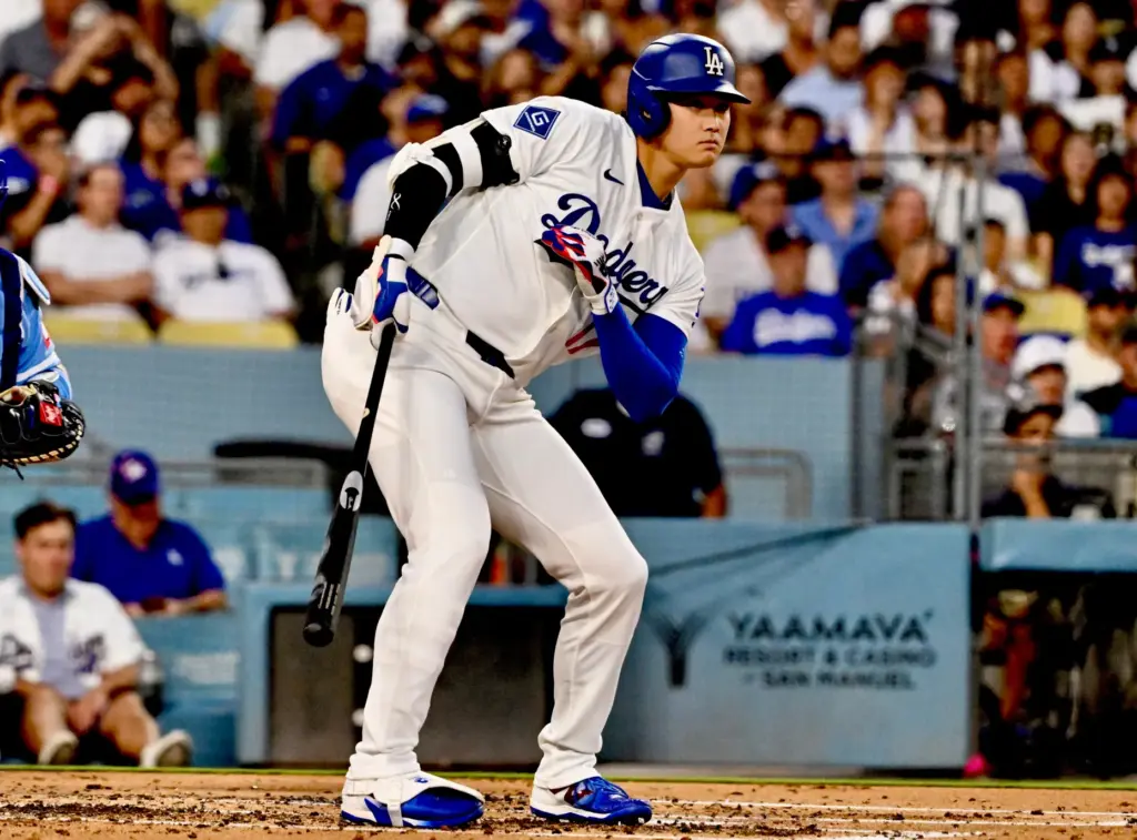 Dodgers star Shohei Ohtani watches his foul ball during the...
