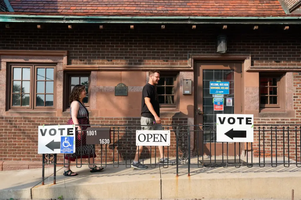 Voters arrive at Charles Allis Art Museum to cast their...
