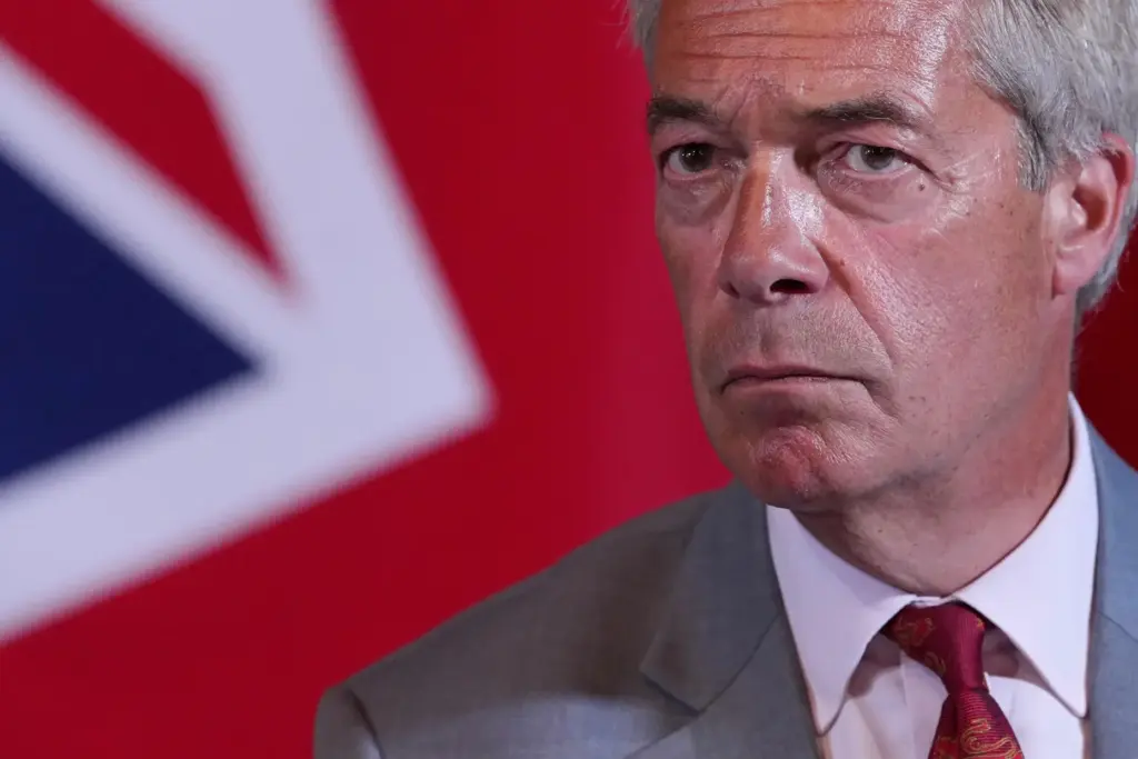 Nigel Farage, leader of Britain's Reform UK party, speaks during a news conference.