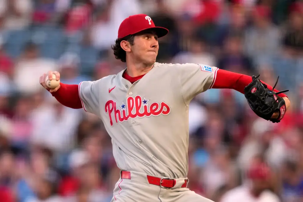 Philadelphia Phillies starting pitcher Andrew Painter throws to the plate...