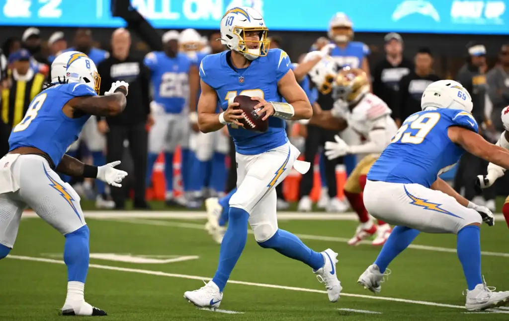 Chargers quarterback Justin Herbert drops back into the pocket during...