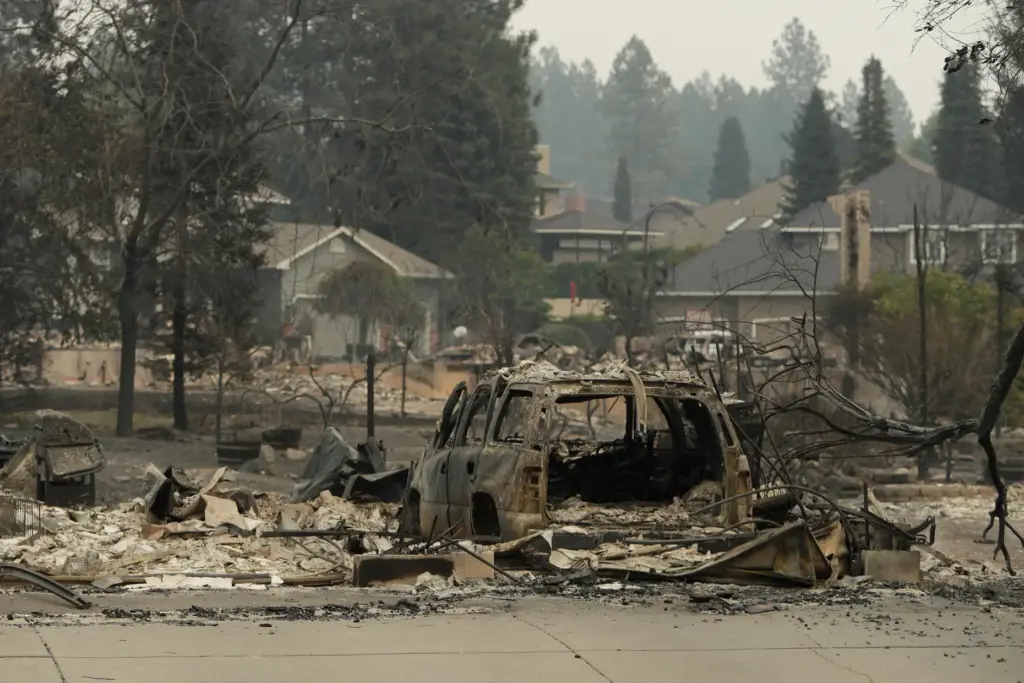 A vehicle and structure are burned in Spokane, Washington.